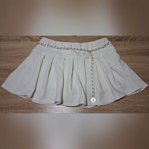 Elegant Cream Mini Skirt with Gold Chain